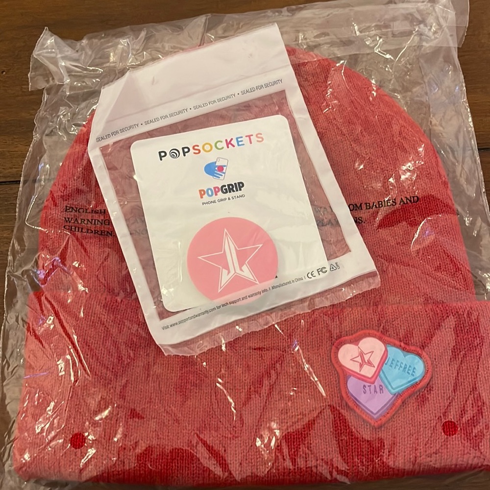 Limited Edition Jeffree Star Valentine’s Day beanie and pink pop socket